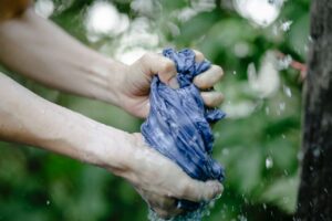 Preparing to hand wash outdoors