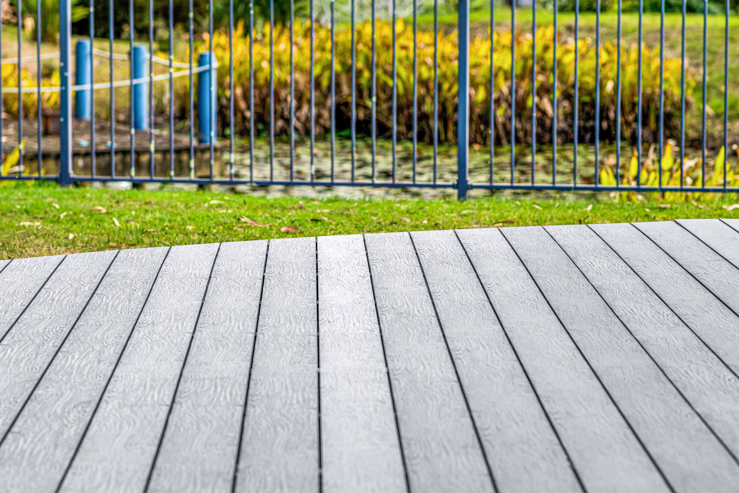 Old boat gray coloured composite decking close up