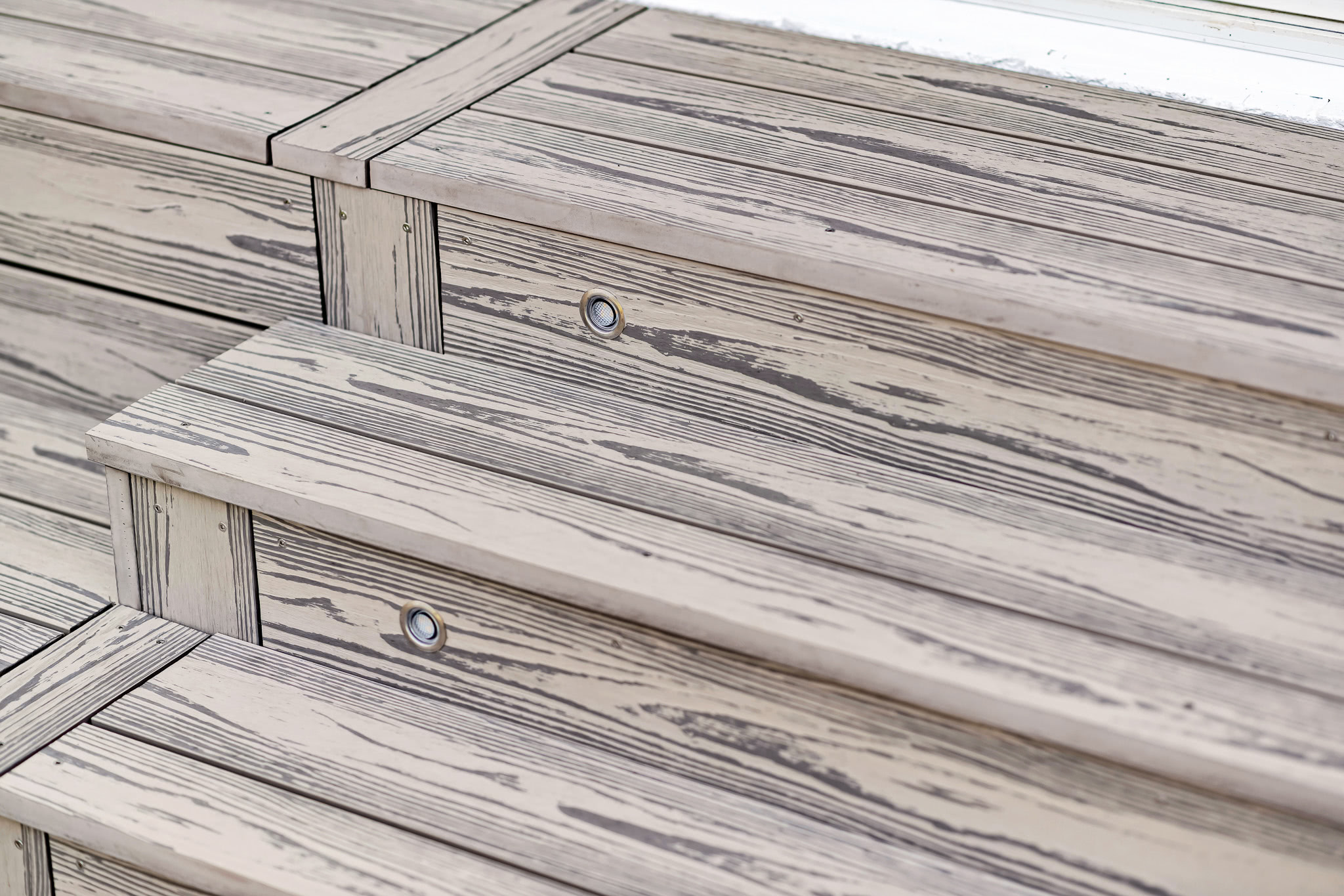A close up view of brite composite decking stairs