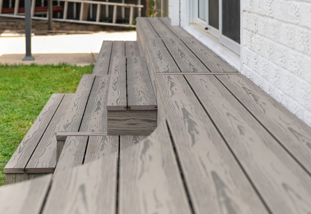 a grey composite decking with steps