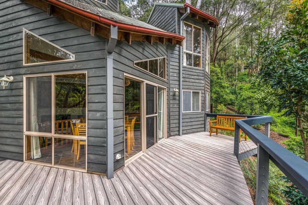 a house with a grey composite decking installed