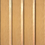 French oak composite cladding in warm golden tones with natural wood texture.