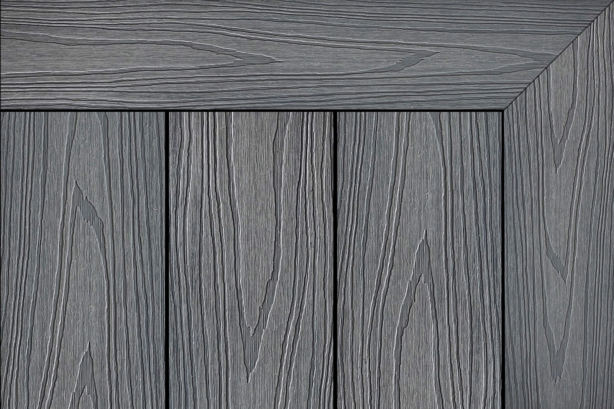Ash-grey wood-look composite decking with pronounced grain and a mitered picture-frame border around three vertical boards
