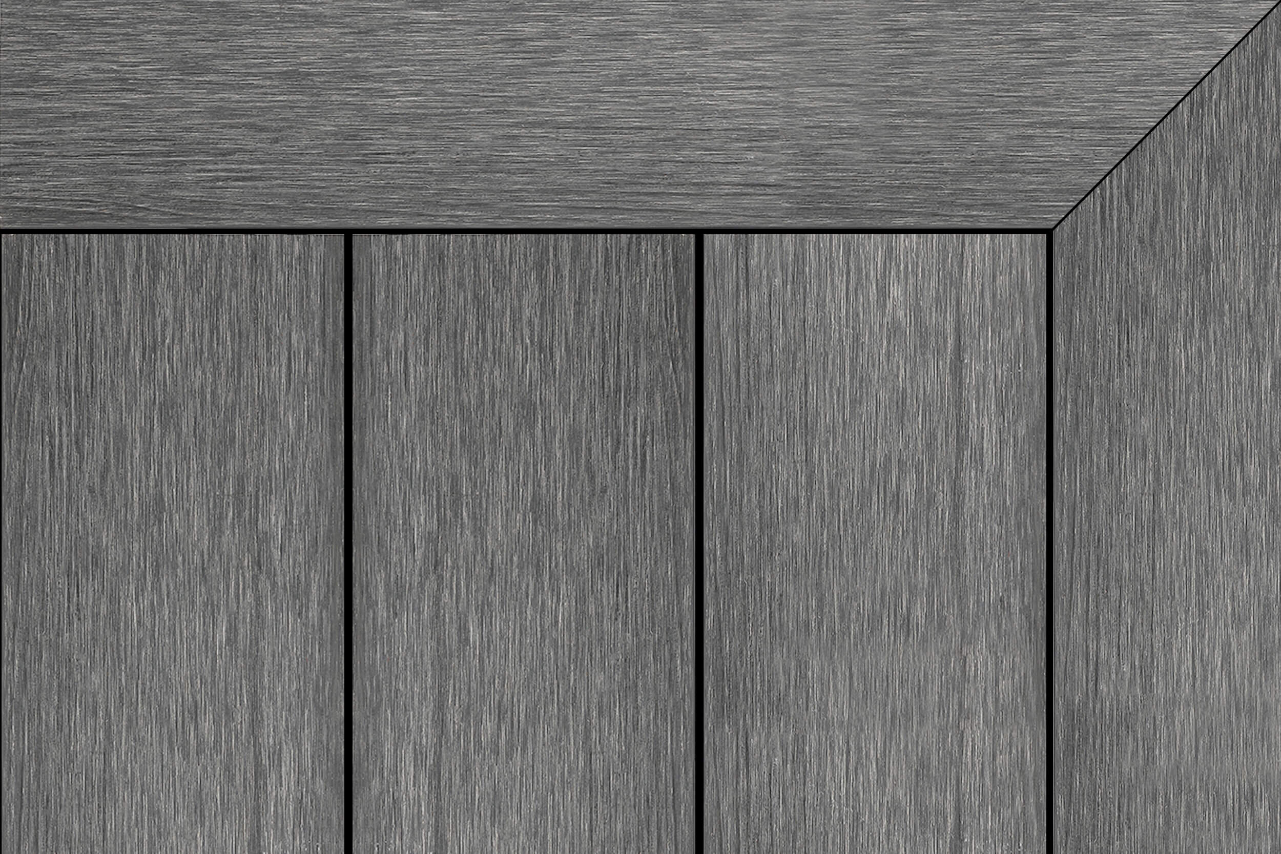 Graphite grey composite decking with subtle linear grain and a mitered picture-frame border around three vertical boards.