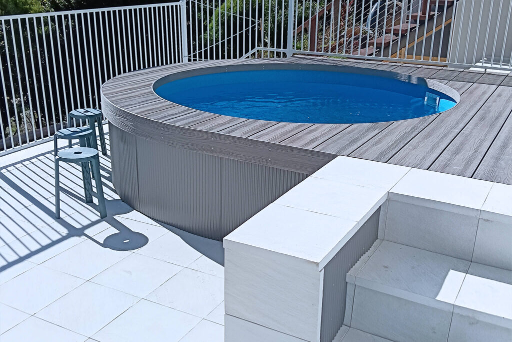 Elevated pool deck with steps and composite decking in NextGen Titanium Fossil colour, Buderim QLD installation