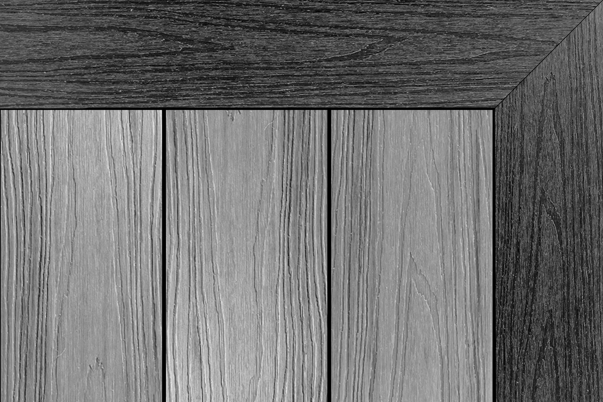 Two-tone composite decking: light grey centre boards with a dark slate-grey mitered picture-frame border (three vertical boards).