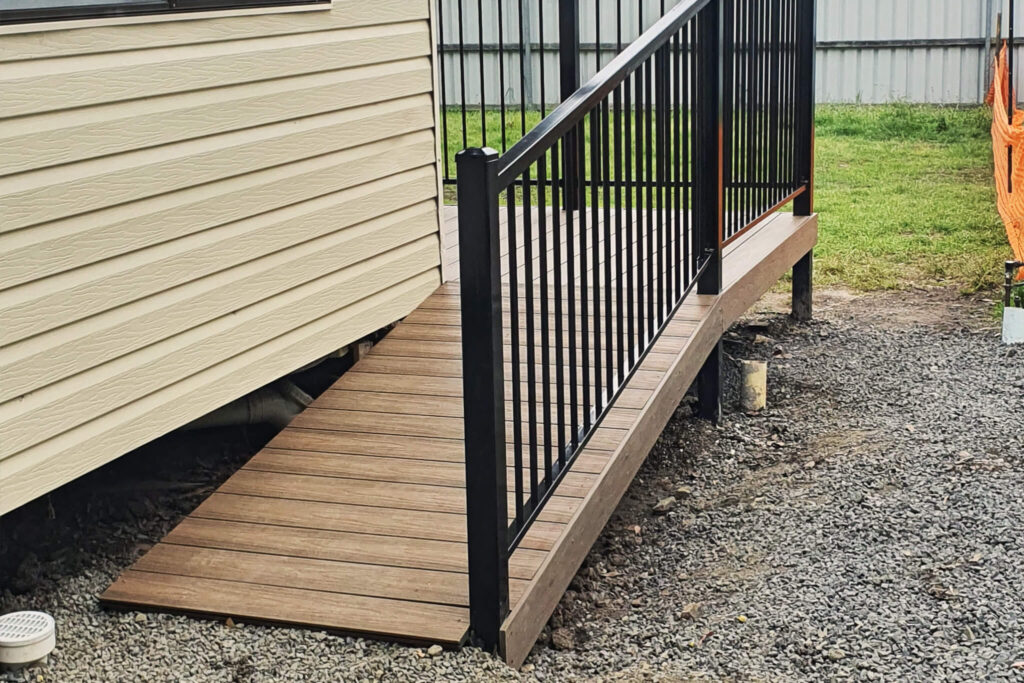 Durable composite decking Tasmania used for cabin ramp access at Discovery Parks Hobart holiday park.