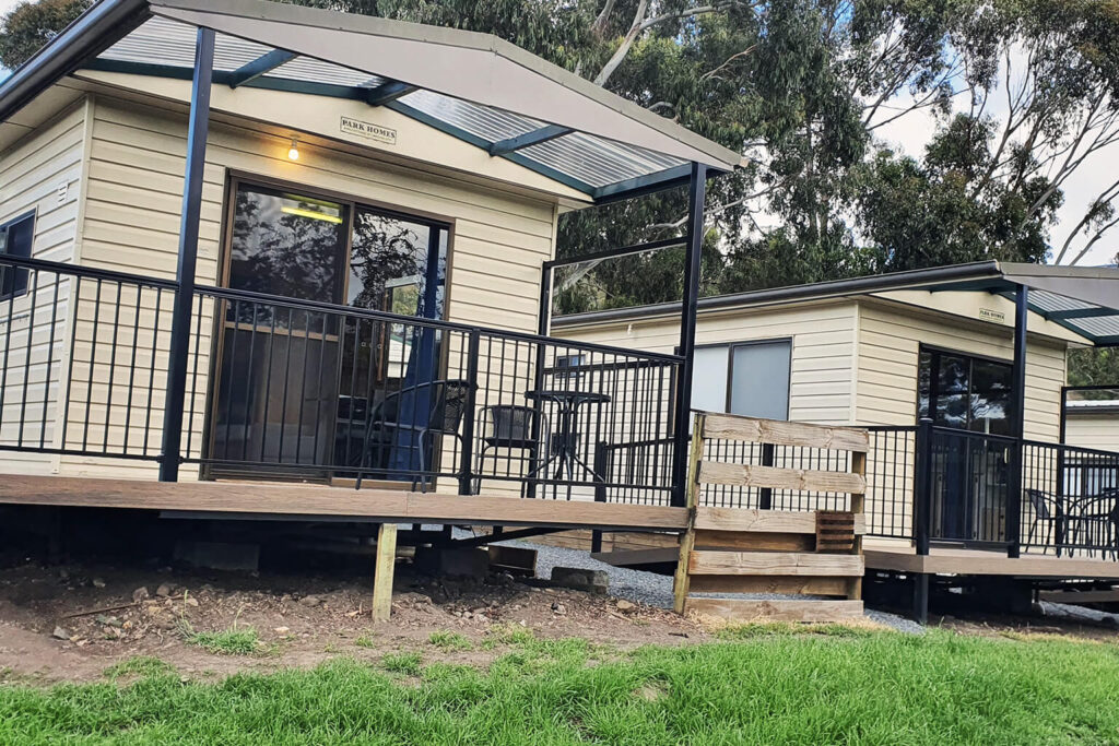 Composite decking Tasmania installed for cabin outdoor areas at Discovery Parks Hobart.